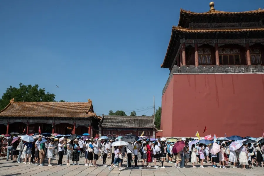 Visitors queue to enter the Palace Museum at the Forbidden City in Beijing, China, on 13 August 2023. (Bloomberg)