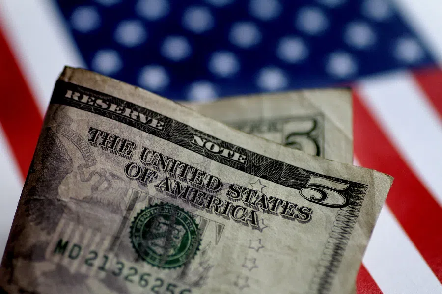 A US five-dollar note is seen in this illustration photo, 1 June 2017. (Thomas White/Illustration/File Photo/Reuters)