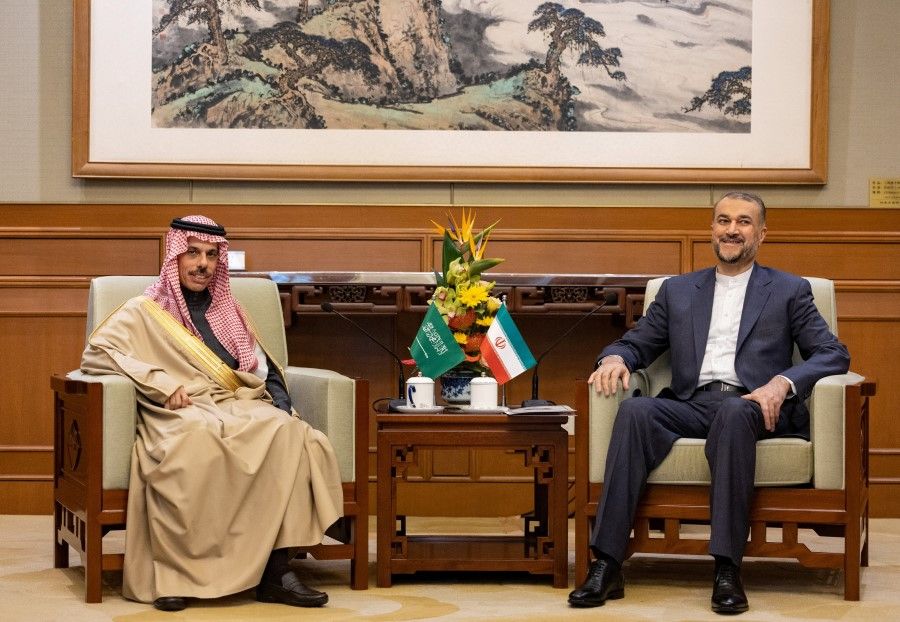 Iranian Foreign Minister Hossein Amir-Abdollahian (right) meets with Saudi Arabia's Foreign Minister Prince Faisal bin Farhan Al Saud (left) in Beijing, China, 6 April 2023. (Saudi Press Agency/Handout via Reuters)