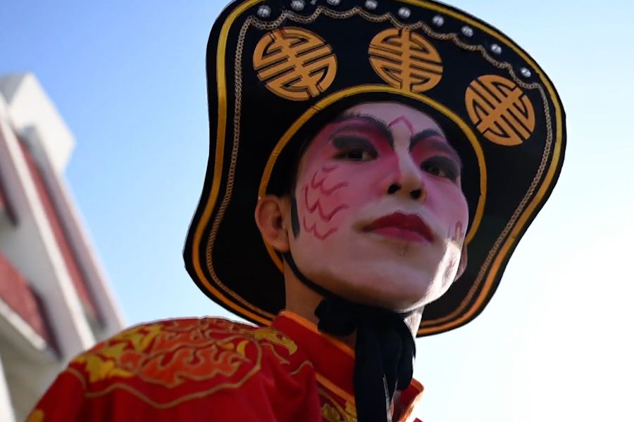 A close-up shot of a Yingge performer in Puning, China, on 17 February 2024. (Screen grab from Anadolu Agency)