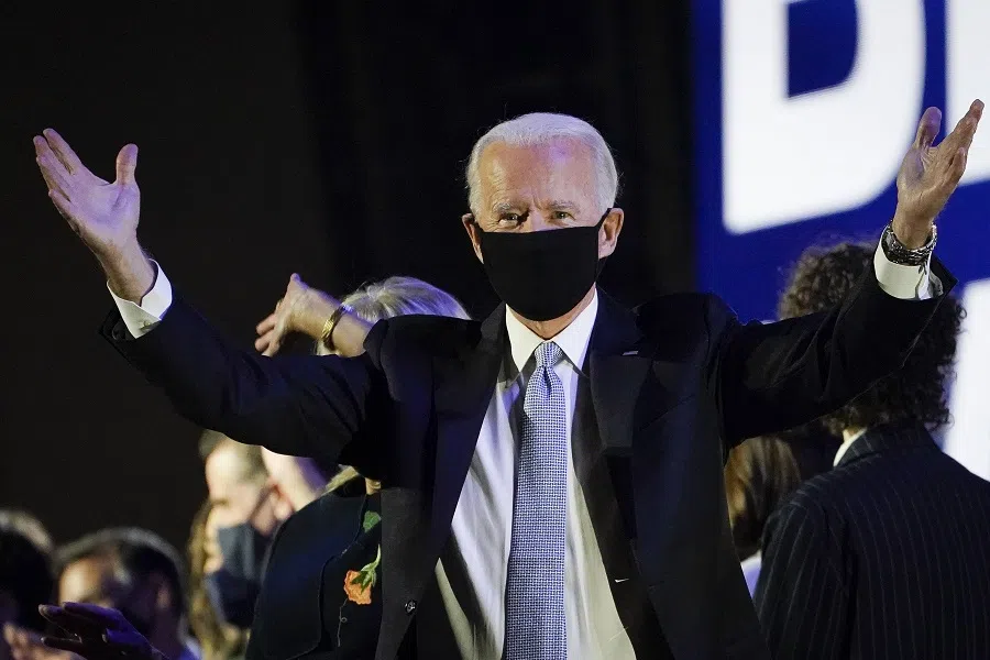 President-elect Joe Biden gestures after speaking to the nation at the Chase Center on 7 November 2020 in Wilmington, Delaware. (Drew Angerer/Getty Images/AFP)
