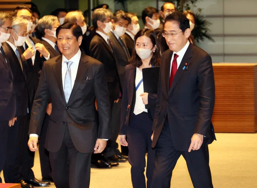 Philippine President Ferdinand Marcos Jr. (left) walks with Japanese Prime Minister Fumio Kishida at the welcoming ceremony at the prime minister’s official residence in Tokyo, Japan, on 9 February 2023. (Yoshikazu Tsuno/Pool via Reuters)
