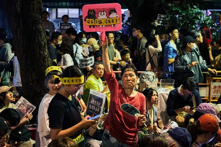 Demonstrators during a protest outside the Legislative Yuan in Taipei, Taiwan, on 24 May 2024.