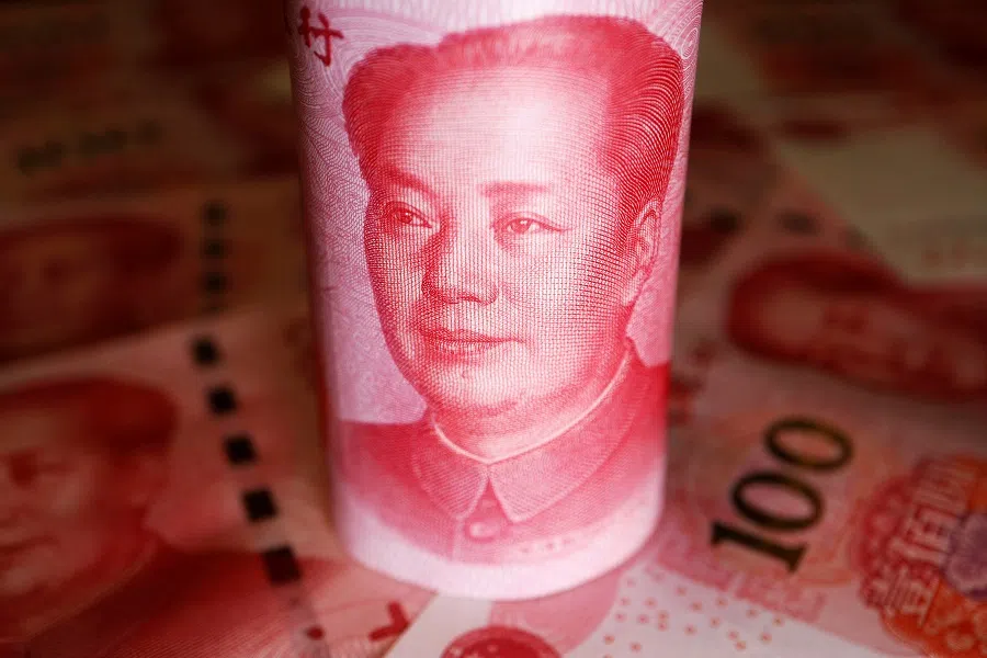 Chinese yuan banknotes are seen in this illustration picture taken on 14 June 2022. (Florence Lo/Illustration/Reuters)