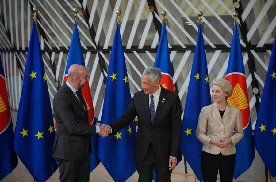 Singapore Prime Minister Lee Hsien Loong (centre) greeting President of the European Council Charles Michel (left) and President of the European Commission Ursula von der Leyen on 14 December 2022 at the one-day ASEAN-EU Commemorative Summit held in Brussels. (SPH Media)