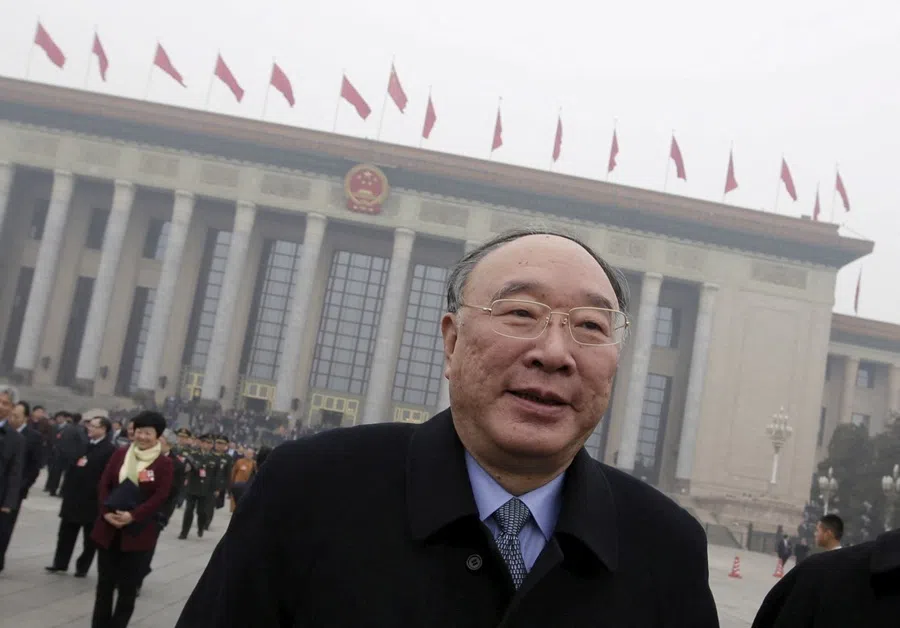 Chongqing mayor Huang Qifan leaves the Great Hall of the People after a plenary meeting of the National People's Congress, China's parliament, in Beijing, China, on 4 March 2016.