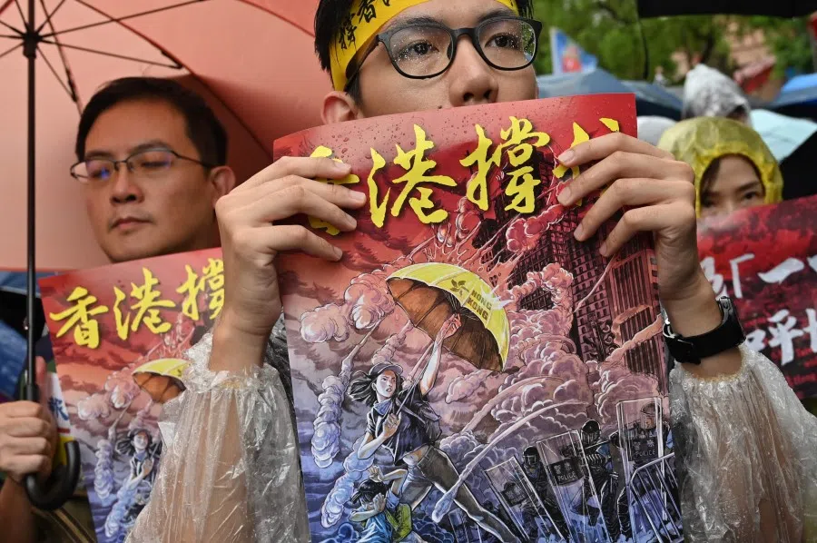 Taiwanese march in the streets outside the parliament in Taipei, September 2019, during a demonstration to support Hong Kong's pro-democracy protests. (Sam Yeh/AFP)