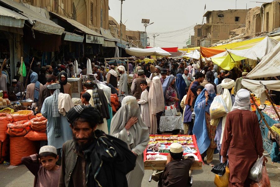 People throng a market in Kandahar, Afghanistan on 27 June 2023. (Sanaullah Seiam/AFP)