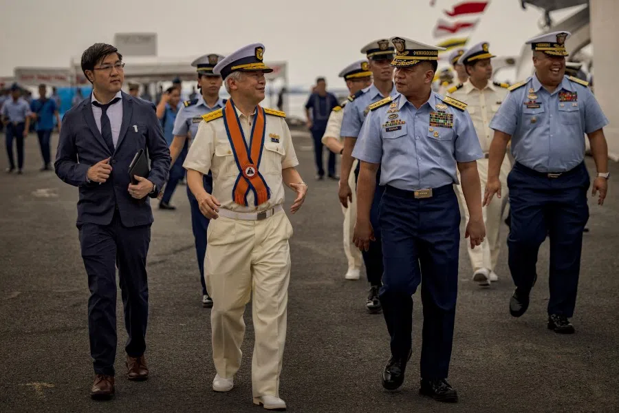Japan Coast Guard Commandant Admiral Shohei Ishii (left) and Philippine Coast Guard Commandant Admiral Ronnie Gil Gavan (right) visit the BRP Teresa Magbanua ship at the Philippine Coast Guard headquarters on 4 November 2023 in Manila, Philippines. (Ezra Acayan/AFP)