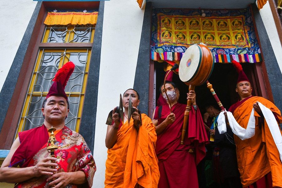Exiled Tibetans participate in a procession to mark the 87th birthday of their spiritual leader, the Dalai Lama, at Jawalakhel Tibetan refugee camp in Lalitpur, on the outskirts of Kathmandu, Nepal, on 6 July 2022. (Prakash Mathema/AFP)