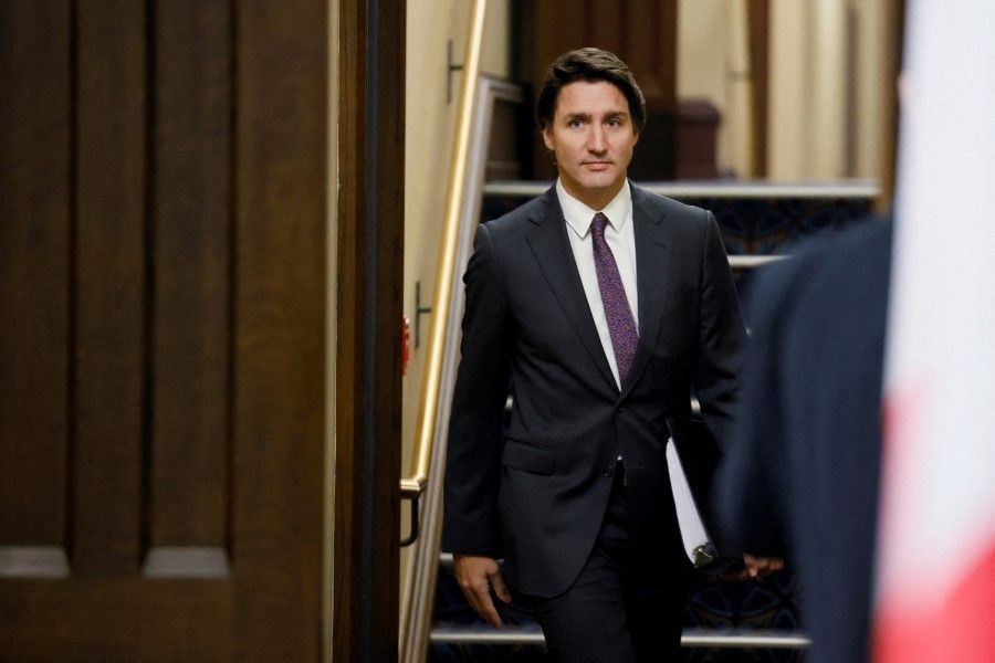 Canada's Prime Minister Justin Trudeau walks to the House of Commons on Parliament Hill in Ottawa, Ontario, Canada, 1 February 2023. (Blair Gable/Reuters)