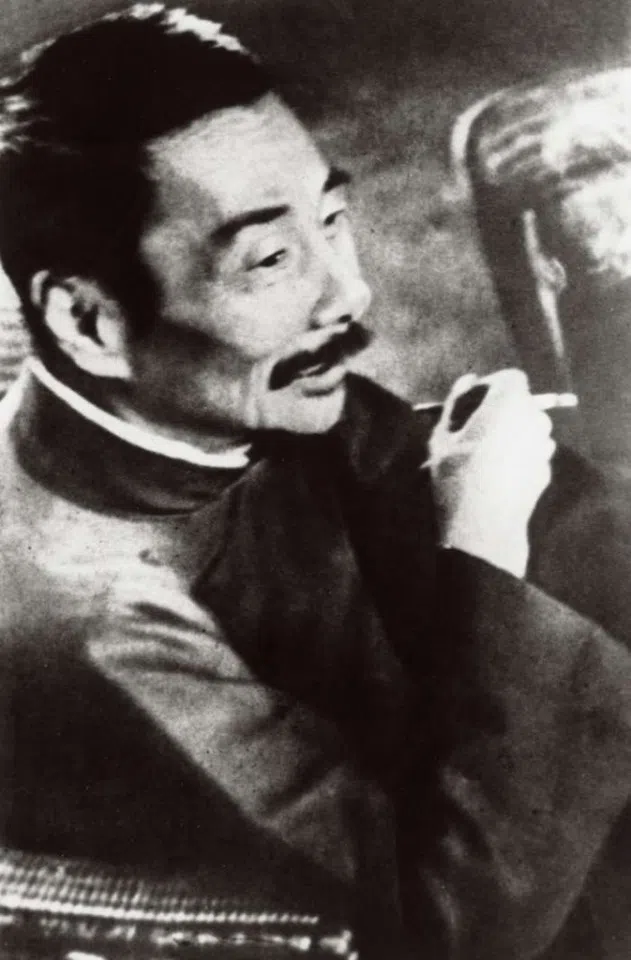 Lu Xun on 8 October 1936, 11 days before his death, attending the Second Woodcarving Exhibition in Baxianqiao, Shanghai. (Wikimedia)