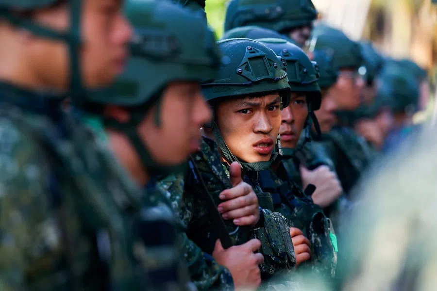 Soldiers take part in the first day of the annual Han Kuang military drills in Taoyuan, Taiwan, on 22 July 2024. (Ann Wang/Reuters)