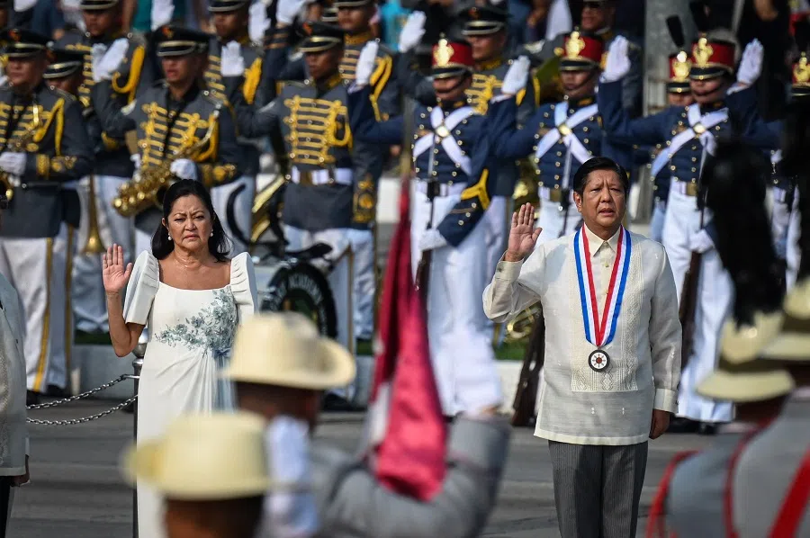 Philippine President Ferdinand Marcos Jr (right) and First Lady Liza Marcos attend the flag raising and wreath laying ceremony during the country’s 126th Independence Day celebrations at Luneta Park in Manila, Philippines, on 12 June 2024. (Jam Sta Rosa/AFP)