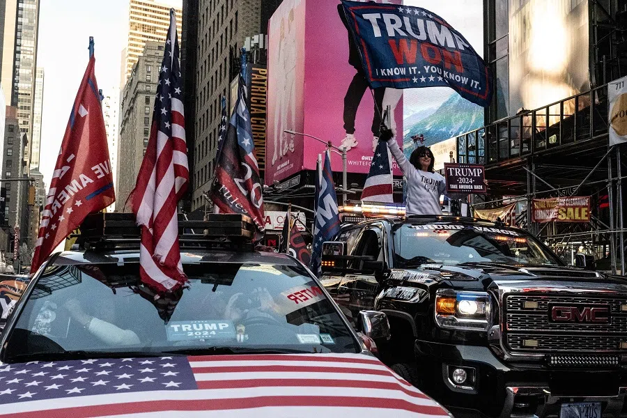 People participate in a car caravan in support of US President-elect Donald Trump on 9 November 2024 in New York City, US. (Stephanie Keith/Getty Images/AFP)