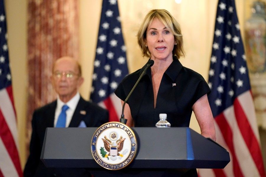 Kelly Craft, the US ambassador to the UN, speaks next to Commerce Secretary Wilbur Ross, during a news conference at the US State Department in Washington, US, 21 September 2020. (Patrick Semansky/Pool via Reuters)