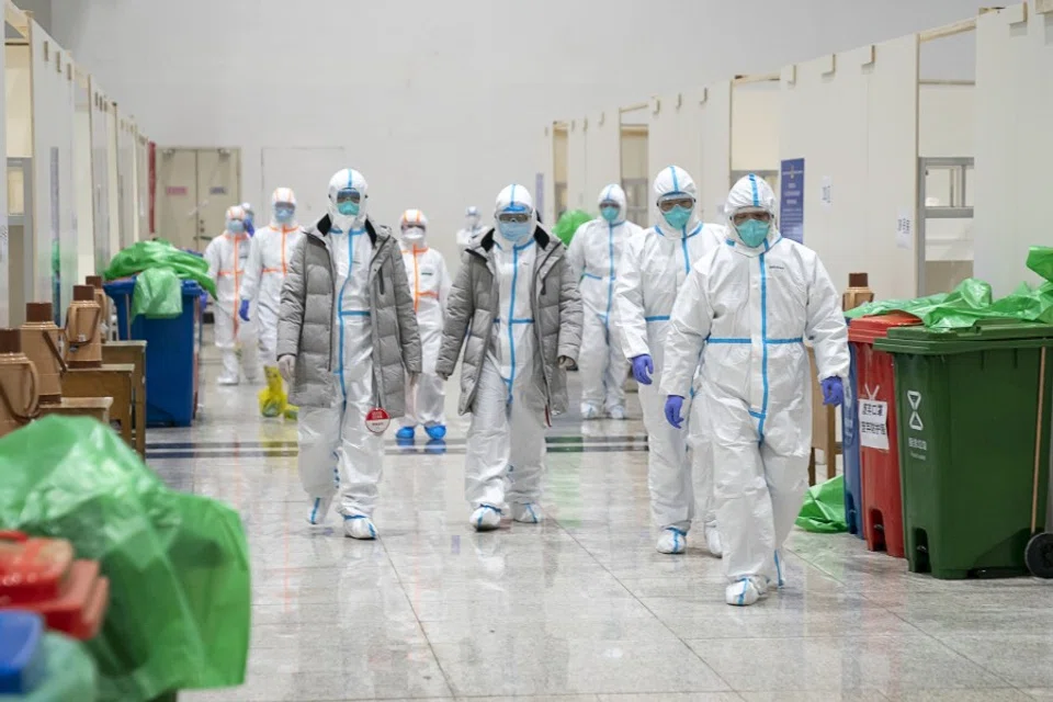 Medical staff at a hospital in Wuhan, 5 February 2020. (Xiong Qi/Xinhua)