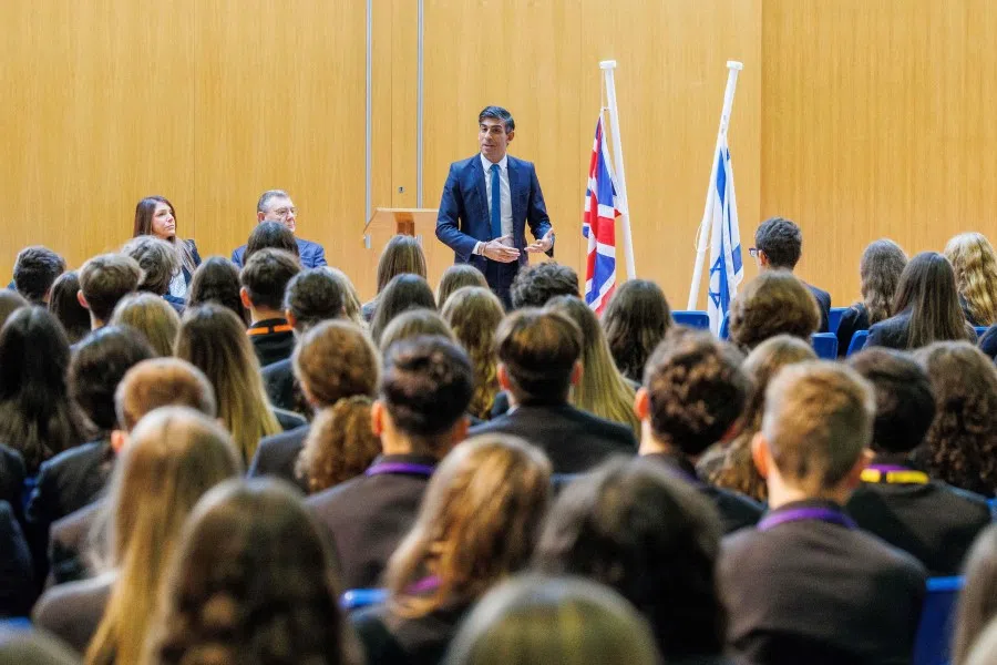 Britain's Prime Minister Rishi Sunak delivers a speech to students of a school in north London, during a visit, on 16 October 2023. (Jonathan Buckmaster/AFP)