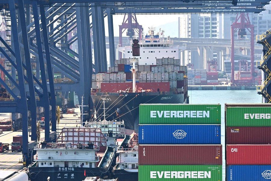 This photo taken on 16 November 2021 shows a container ship docked at Kwai Chung container terminal in Hong Kong. (Peter Parks/AFP)