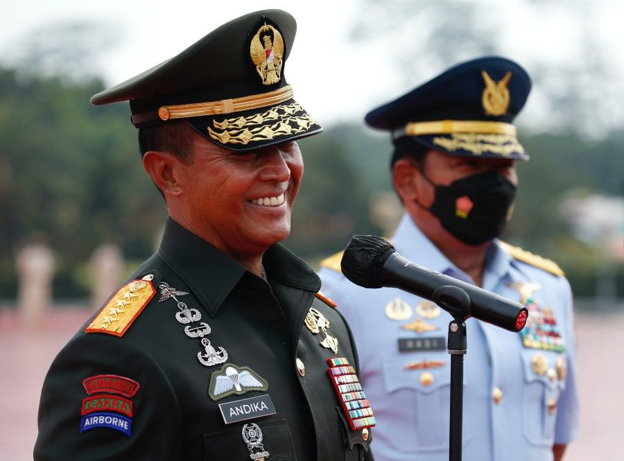 Indonesia's new military chief General Andika Perkasa speaks to journalists during a press conference with retired Indonesia's military chief Air Chief Marshal Hadi Tjahjanto, after a handover ceremony at the Indonesian Military Headquarters in Jakarta, Indonesia, 18 November 2021. (Willy Kurniawan/Reuters)