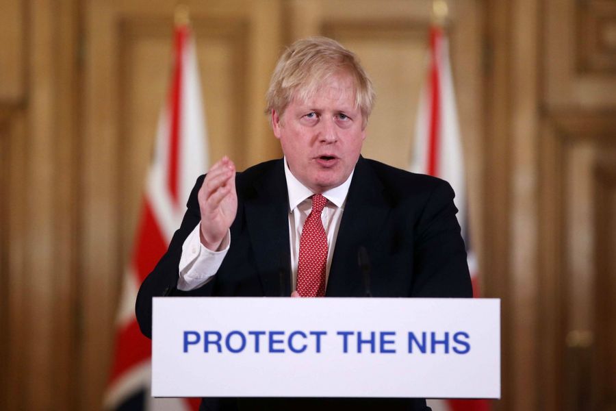 UK Prime Minister Boris Johnson gestures during a news conference to give a daily update on the government's response to the Covid-19 outbreak on 22 March 2020. (Ian Vogler/POOL/AFP)