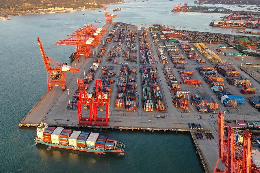 This aerial photo taken on 11 October 2021 shows containers stacked at Lianyungang port, in Jiangsu province, China. (STR/AFP)