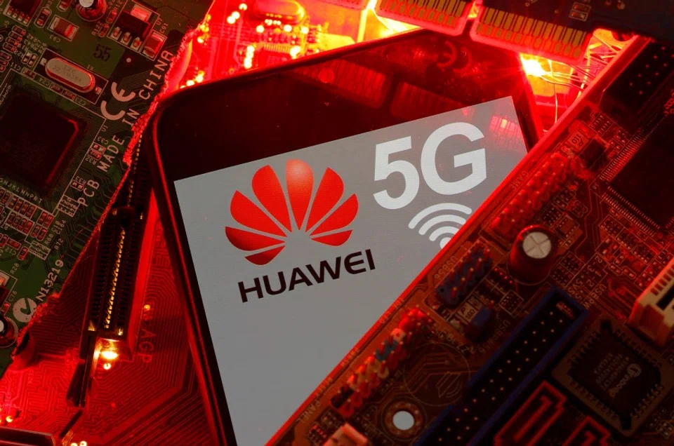 A smartphone with the Huawei and 5G network logo is seen on a PC motherboard in this illustration picture, 29 January 2020. (Dado Ruvic/REUTERS)