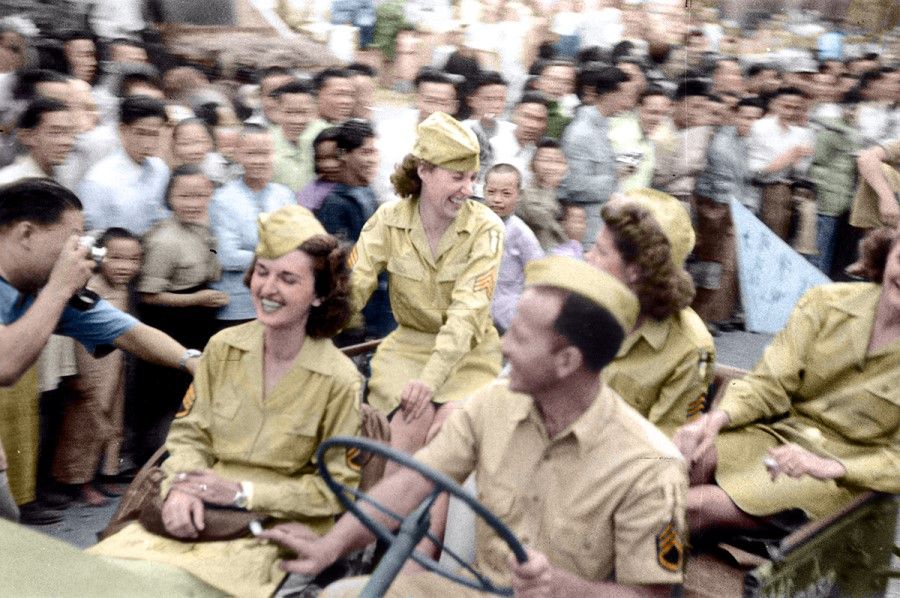 A victory parade in Chongqing, 3 September 1945. The female soldiers in the US jeep leading the parade have caught the celebratory atmosphere among the Chinese.