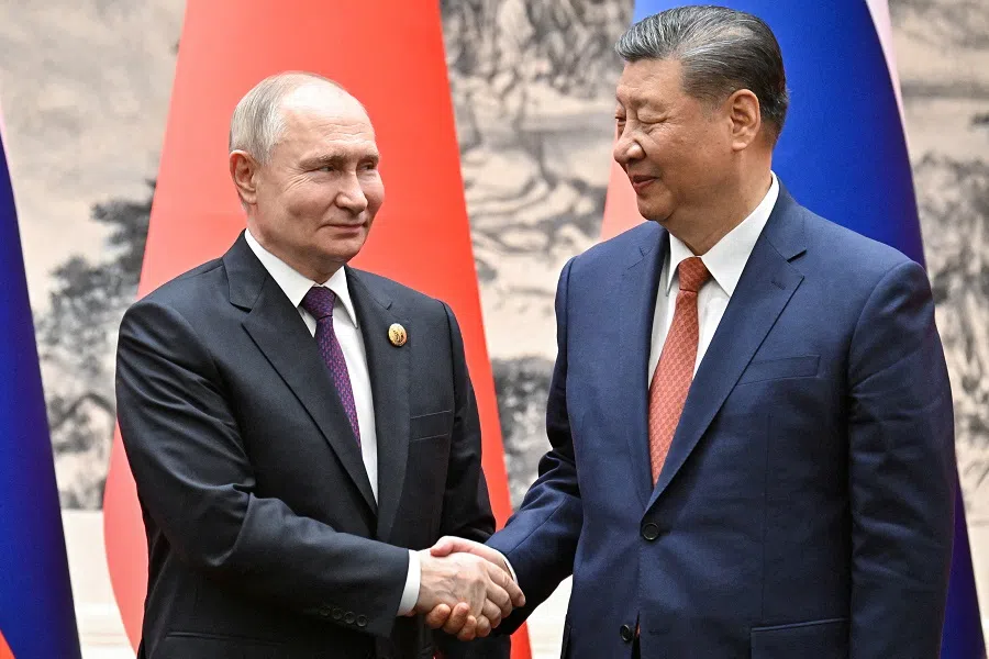 Russian President Vladimir Putin shakes hands with Chinese President Xi Jinping during a meeting in Beijing, China on 16 May 2024.