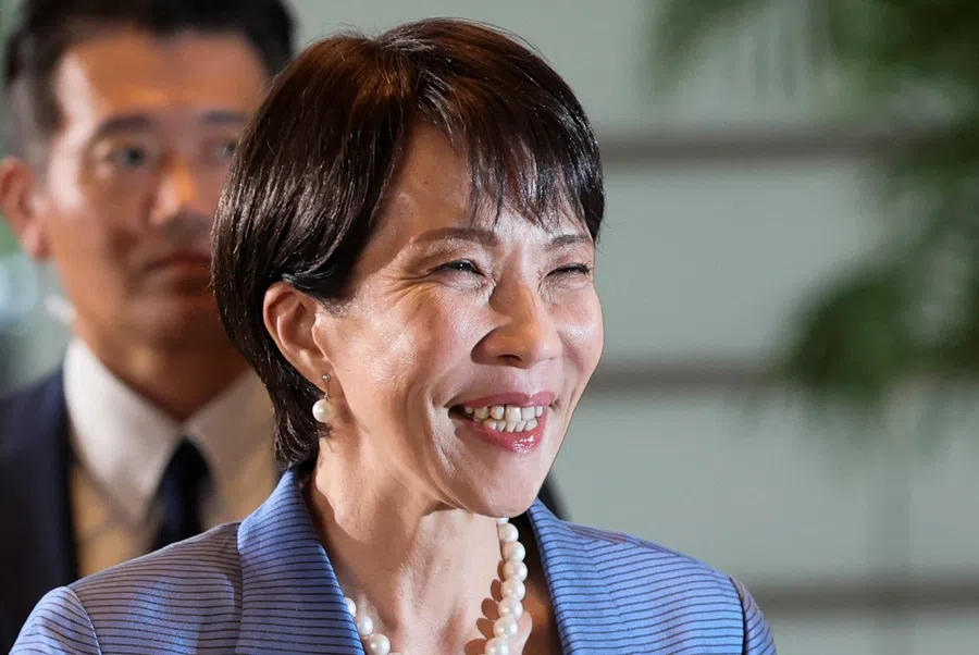 Japan’s new Prime Minister Sanae Takaichi smiles as she arrives at the prime minister’s official residence in Tokyo, Japan on 21 October 2025.