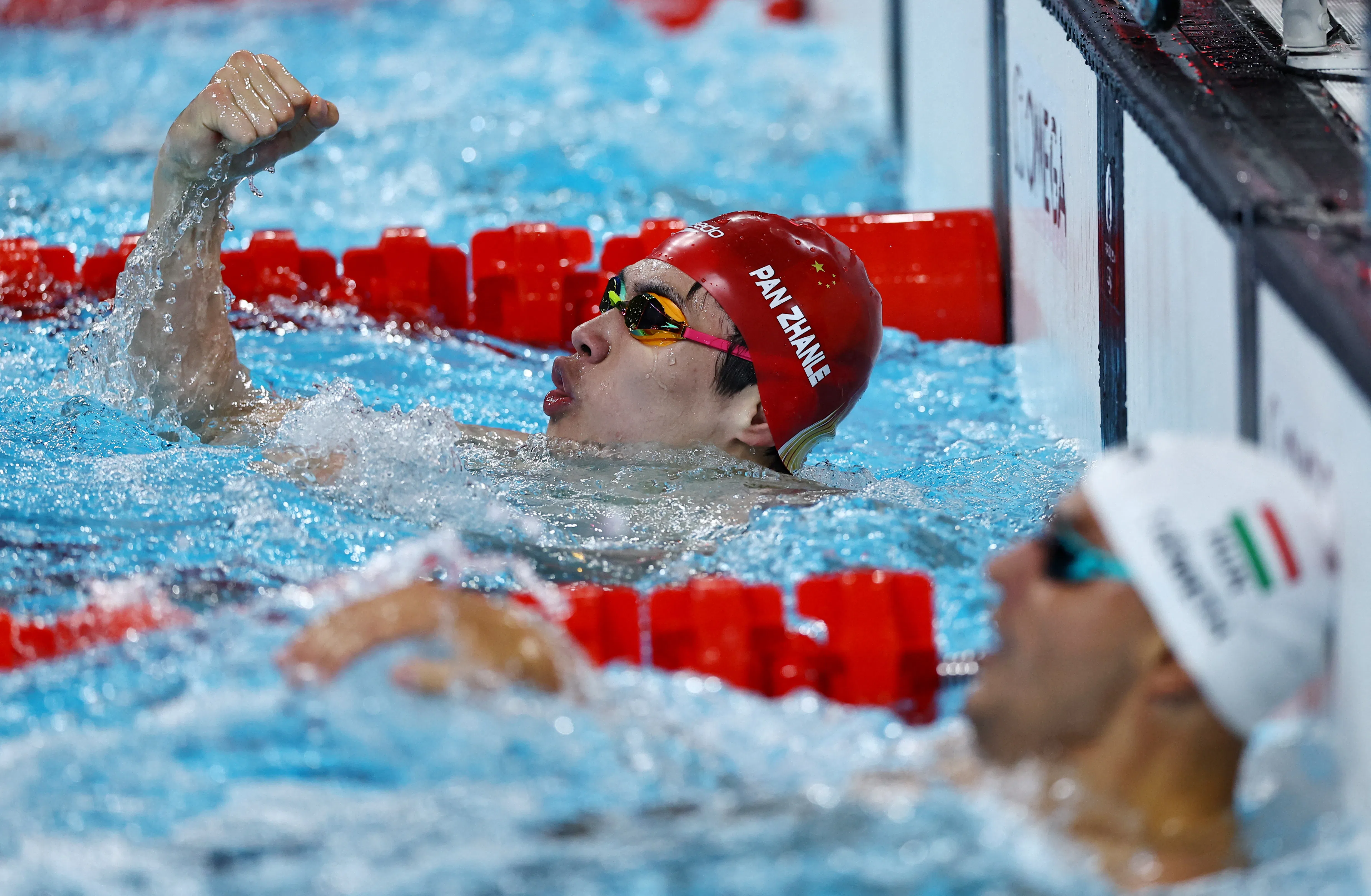 Pan Zhanle reacts after winning the men’s 100m freestyle final and setting a new world record at the Paris 2024 Olympics, on 31 July 2024. (Ueslei Marcelino/Reuters)
