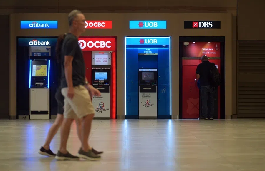 A man walks past ATM machines located at Changi Airport, Singapore., on 13 July 2026.