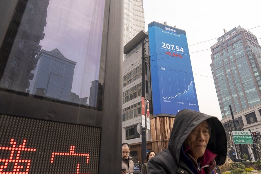 A public screen displaying stock figures in Shanghai, China, on 29 January 2024. (Raul Ariano/Bloomberg)