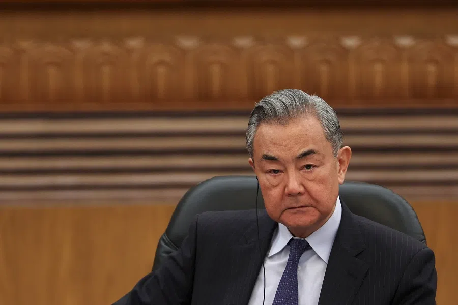 Chinese Foreign Minister Wang Yi attends a meeting at the Great Hall of the People in Beijing, China, on 28 March 2025. (Florence Lo/Reuters)