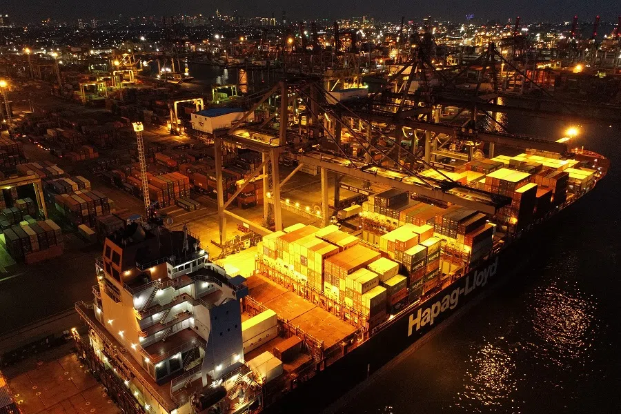 A ship loaded with containers is docked at the Port of Tanjung Priok in Jakarta, Indonesia, on 14 November 2020. (Dimas Ardian/Bloomberg)