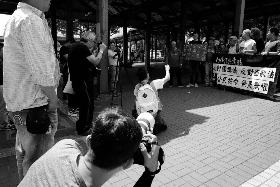 A small protest against laws prohibiting disrespect to the Chinese flag and national anthem in 2018. (Candice Chan/SPH Media)