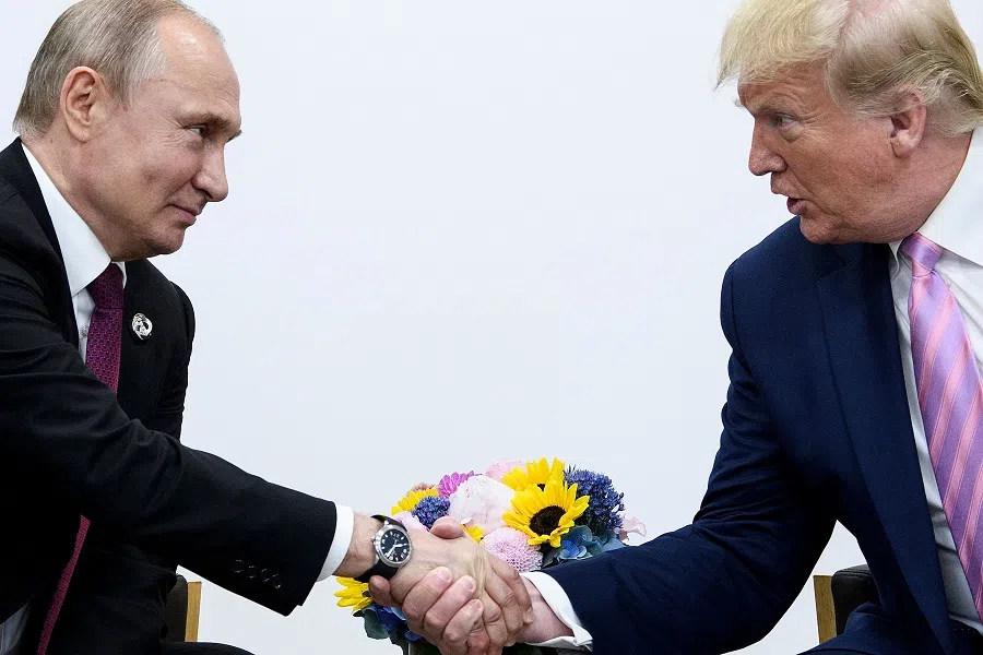 US President Donald Trump (right) attends a meeting with Russian President Vladimir Putin during the G20 summit in Osaka on 28 June 2019. (Brendan Smialowski/AFP)