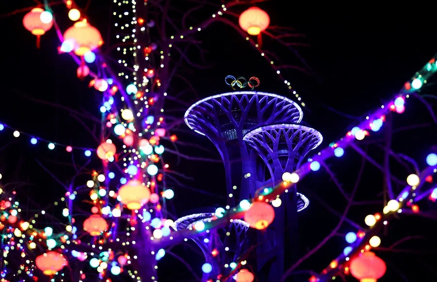 Illuminated lanterns are pictured in front of the Beijing Olympic Tower ahead of the Beijing 2022 Winter Olympics in Beijing, China, 26 January 2022. (Fabrizio Bensch/Reuters)
