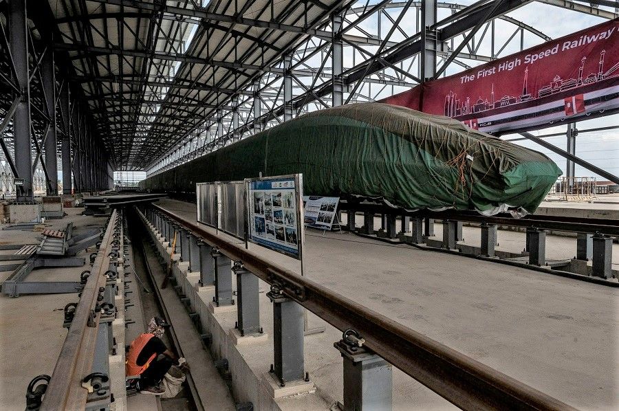 An Electric Multiple Unit high-speed train for a rail link project, which is part of China's Belt and Road Initiative is seen at the Tegalluar train depot construction site in Bandung, Indonesia, 1 October 2022, in this photo taken by Antara Foto. (Antara Foto/Aprillio Akbar via Reuters)