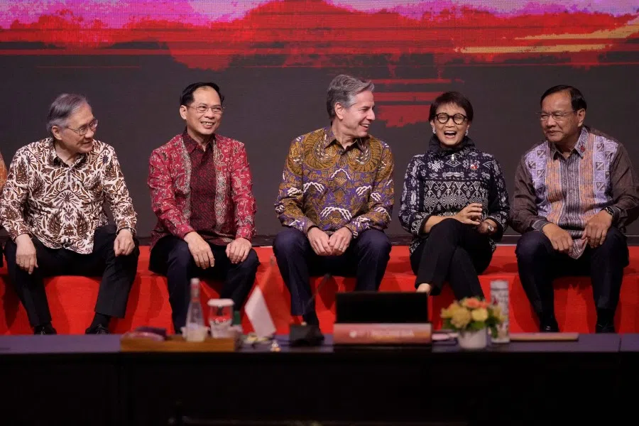 (Left to right) Thailand's Foreign Minister Don Pramudwinai, Vietnam's Foreign Minister Bui Thanh Son, US Secretary of State Antony Blinken, Indonesian Foreign Minister Retno Marsudi and Cambodia's Foreign Minister Prak Sokhonn share a light moment during a group photo session during the ASEAN Post Ministerial Conference with the US at the ASEAN Foreign Ministers' Meeting in Jakarta on 14 July 2023. (Dita Alangkara/AFP)