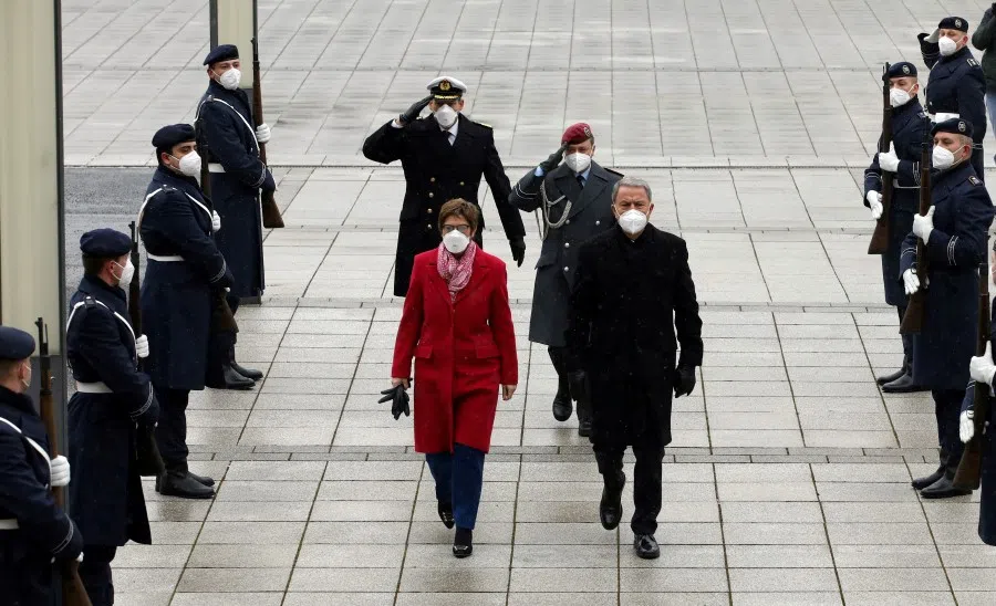 German Defence Minister Annegret Kramp-Karrenbauer welcomes her Turkish counterpart Hulusi Akar before their meeting in Berlin, Germany, 2 February 2021. (Arif Akdogan/Turkish Defence Ministry/Handout via REUTERS)