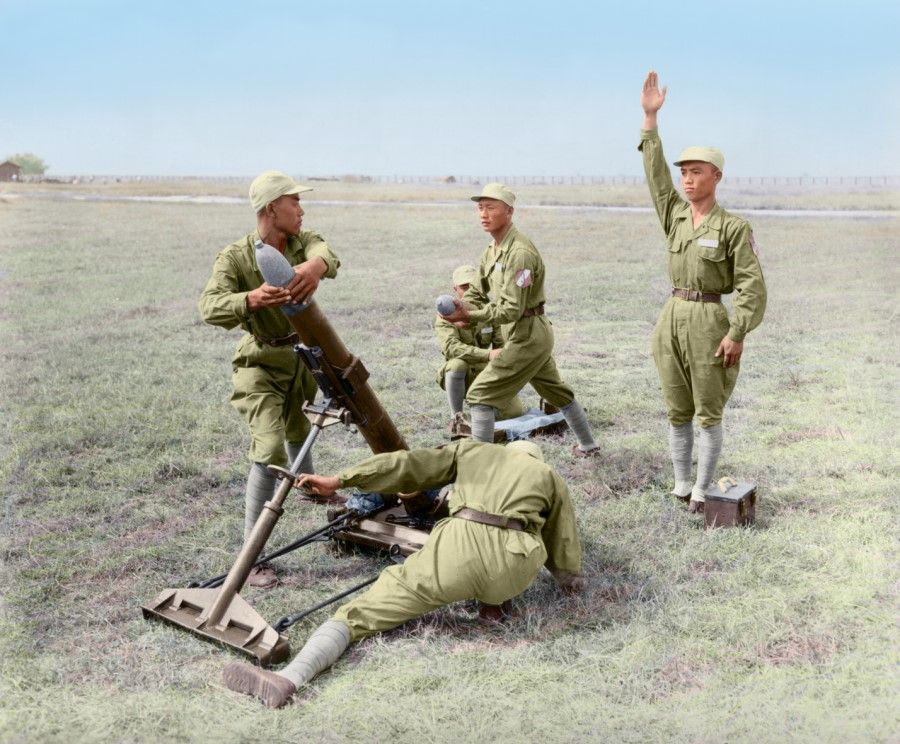 R.O.C Military Academy students at mortar training on Fengshan, Kaohsiung, 1952. Soldiers were divided into groups of five, with different roles assigned to each person.