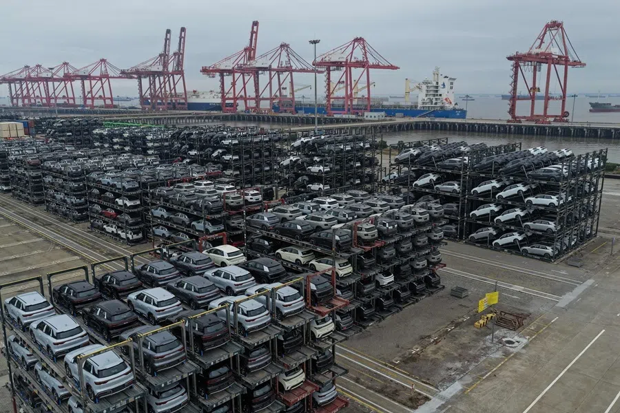 Chinese-made cars are seen in specialised vehicle racks in preparation for loading onto ships for export, at the Taicang Port area of Suzhou Port, in China’s eastern Jiangsu province on 12 October 2026.