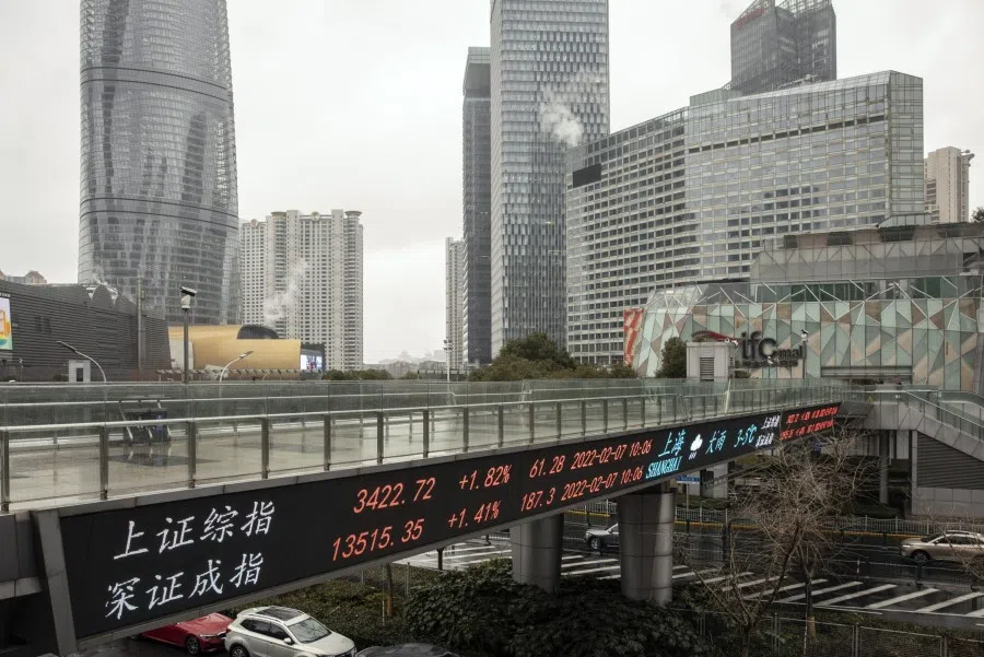 An electronic ticker displays stock figures in Pudong's Lujiazui Financial District in Shanghai, China, on 7 February 2022. (Qilai Shen/Bloomberg)