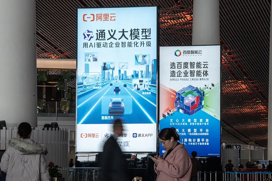 Advertisements for Alibaba Cloud and Baidu Cloud at the Beijing Capital International Airport in Beijing, China, on 28 February 2025. (Na Bian/Bloomberg)