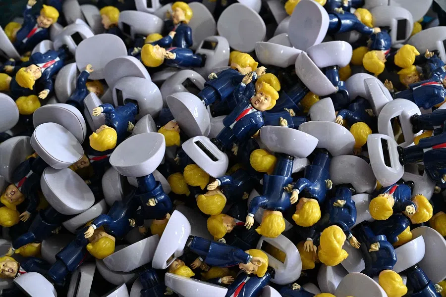 Parts for toys depicting US President Donald Trump are seen at a factory specialising in solar powered plastic gadgets in Yiwu, China’s eastern Zhejiang province on 11 April 2025.