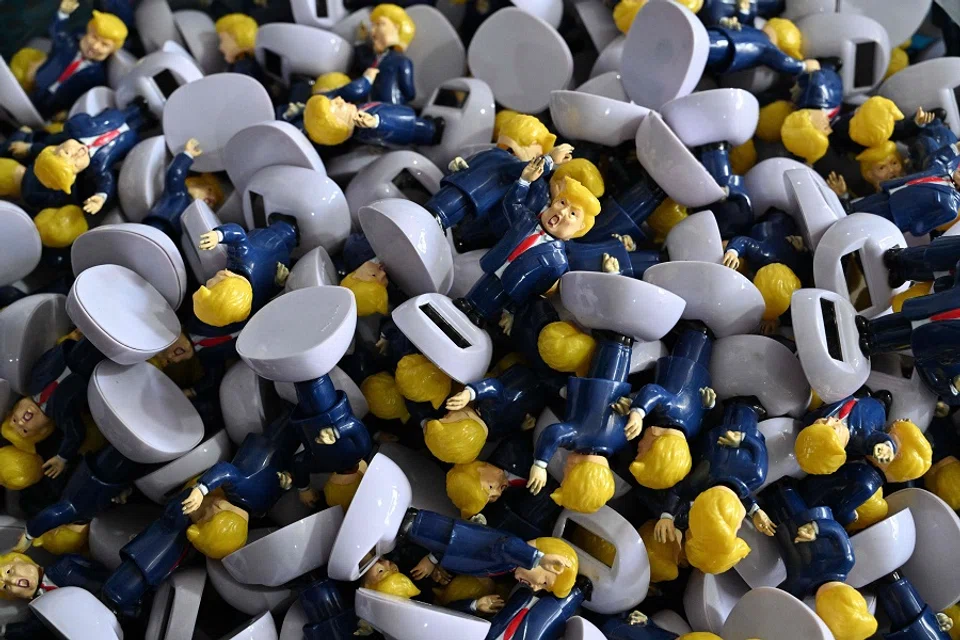 Parts for toys depicting US President Donald Trump are seen at a factory specialising in solar powered plastic gadgets in Yiwu, China’s eastern Zhejiang province on 11 April 2025. (Adek Berry/AFP)