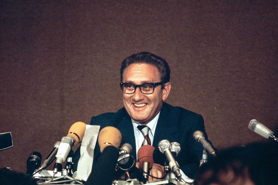 Henry Kissinger laughs during a press conference on 13 June 1973 in Paris. (AFP)