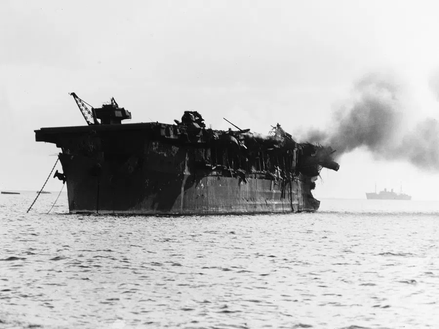 The US Navy light aircraft carrier USS Independence on fire soon after the atomic bomb air burst test “Able” at Bikini on 1 July 1946. The bomb had exploded off the ship’s port quarter, causing massive blast damage in that area, and progressively less further forward. The carrier did not sink during the tests and was finally sunk as a target off San Francisco, California, US, on 27 January 1951. (Wikimedia)