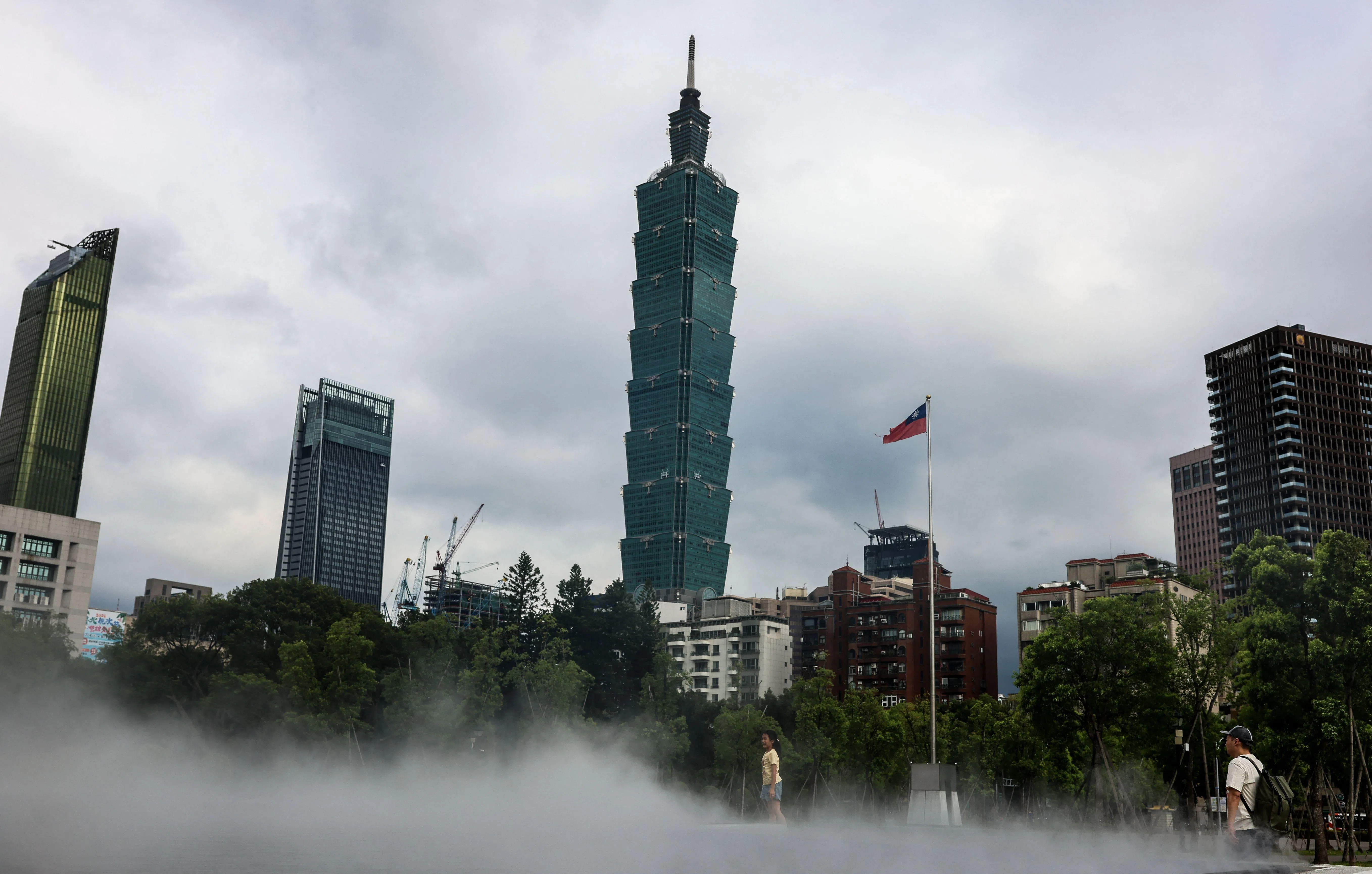 A mist installation is seen at Sun Yat-sen Memorial Hall with Taipei 101 in the background, in Taipei on 3 July 2026.